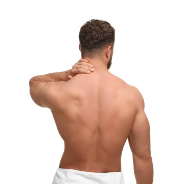 Man suffering from neck pain on white background, back view