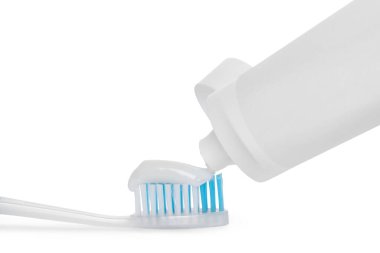Diş fırçasına beyaz arkaplana yapıştırma, yakın plan