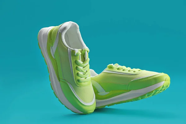 Pair Stylish Green Sneakers Levitating Teal Background — Stock Photo, Image