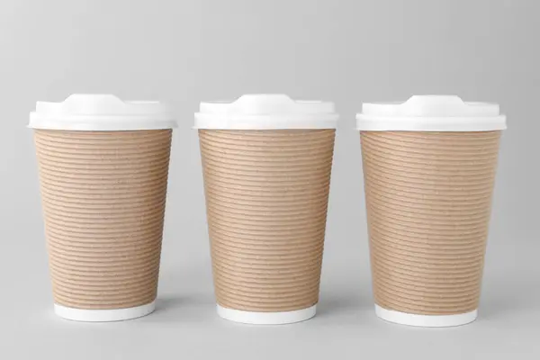 Paper Cups White Lids Light Grey Background Coffee — Stock Photo, Image