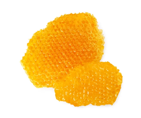 ホワイト トップビューで分離されたおいしい蜂蜜と天然ハニカムのピース — ストック写真