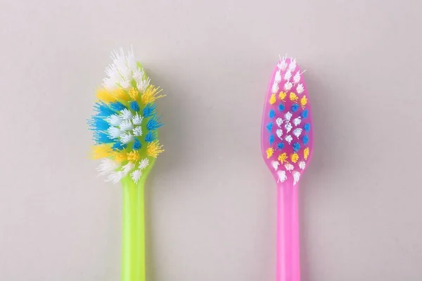 Colorful Plastic Toothbrushes Light Background Flat Lay — Stock Photo, Image