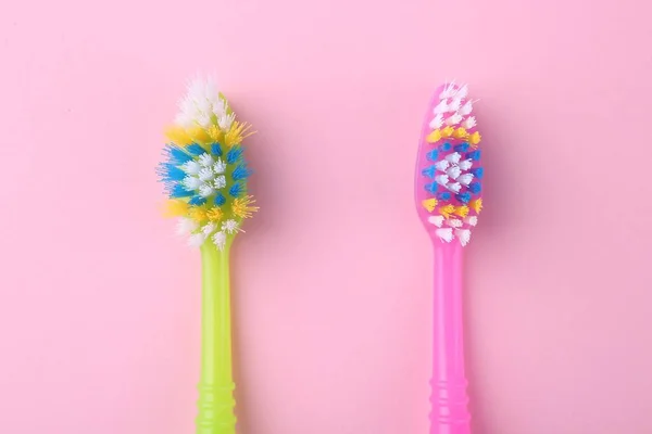 Colorful Plastic Toothbrushes Pink Background Flat Lay — Stock Photo, Image