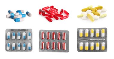 Beyaza izole edilmiş birçok farklı hapla ayarlanmış.