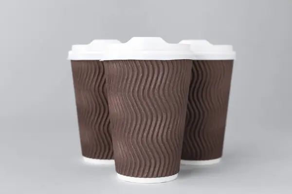 Paper Cups White Lids Light Grey Background Coffee — Stock Photo, Image