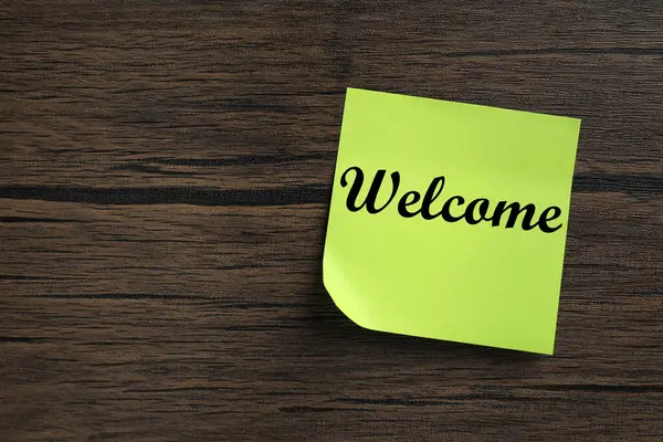 Sticky Note Word Welcome Wooden Table Top View Space Text — Stock Photo, Image