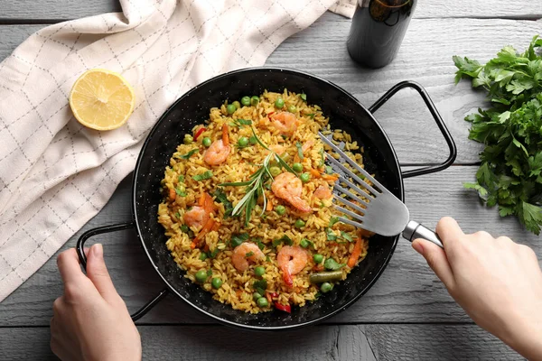 Woman Taking Tasty Fried Rice Grey Wooden Table Top View — Stock Photo, Image