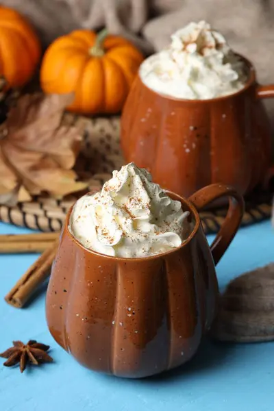 Mugs Pumpkin Spice Latte Whipped Cream Light Blue Wooden Table — Stock Photo, Image