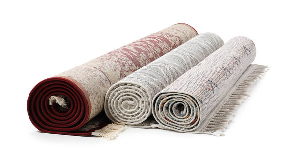 Rolled carpets on white background. Interior element
