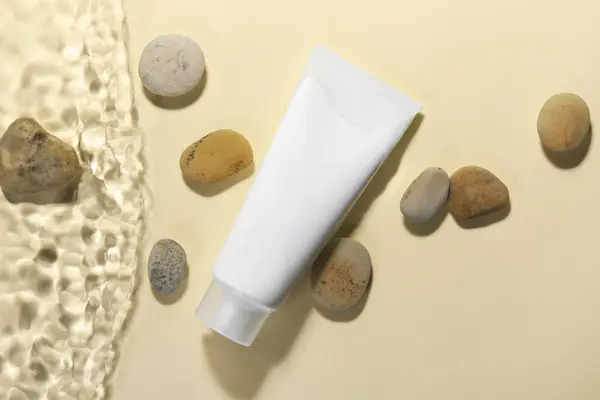 Tube Face Cleansing Product Stones Water Beige Background Flat Lay — Stock Photo, Image