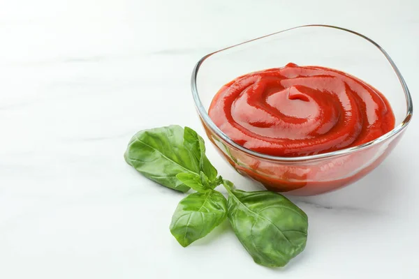 Bowl Tasty Ketchup Basil White Marble Table Closeup Space Text — Stock Photo, Image