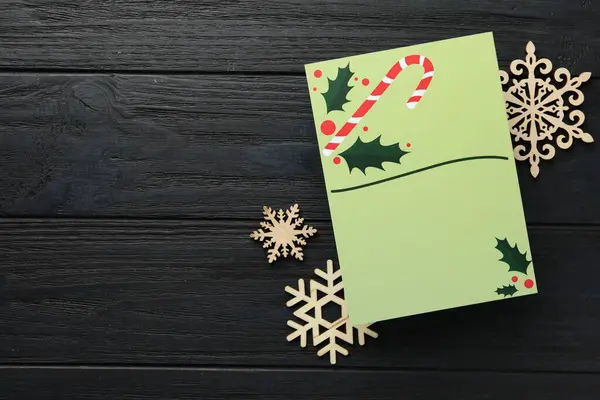 Blank Christmas Invitation Card Decorative Snowflakes Black Wooden Table Flat — Stock Photo, Image