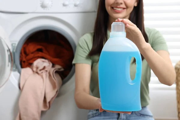 Woman Holding Fabric Softener Washing Machine Dirty Clothes Closeup Space — Stock Photo, Image