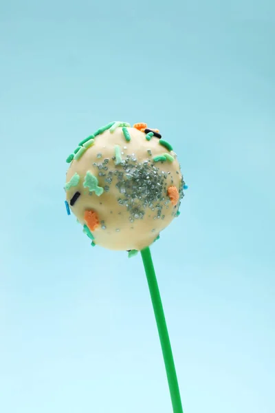 Sweet Cake Pop Decorated Sprinkles Light Blue Background Closeup Delicious — Stock Photo, Image