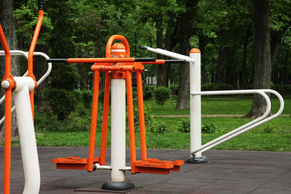 Empty outdoor gym with double abductor and push up bars