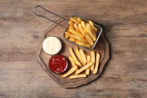 Tasty French Fries Served Sauces Wooden Table Top View — Stock Photo, Image