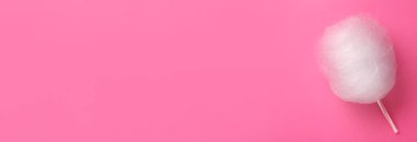 Pembe arka planda güzel pamuk helva, güzel manzara. Metin için alanı olan pankart tasarımı