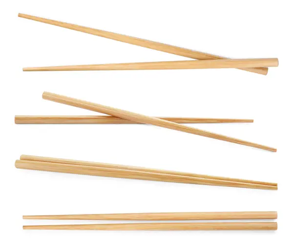 用木制筷子隔离在白色上的学院 — 图库照片