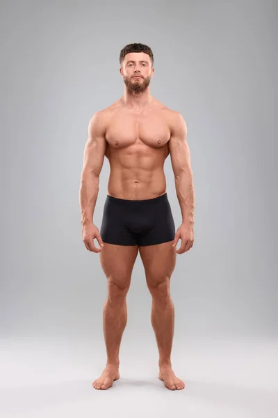 Schöner Muskulöser Mann Auf Hellgrauem Hintergrund Sexy Körper — Stockfoto