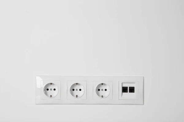 Many Power Sockets Ethernet Plate White Wall Indoors Space Text — Stock Photo, Image