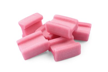 Beyaz arka planda bir sürü lezzetli pembe sakız.