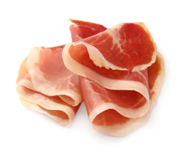 Slices of delicious jamon on white background