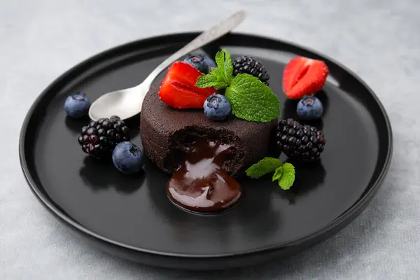 Plate Delicious Chocolate Fondant Berries Mint Grey Table Closeup — Stock Photo, Image