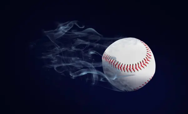 Baseball ball flying leaving smoke after on black background