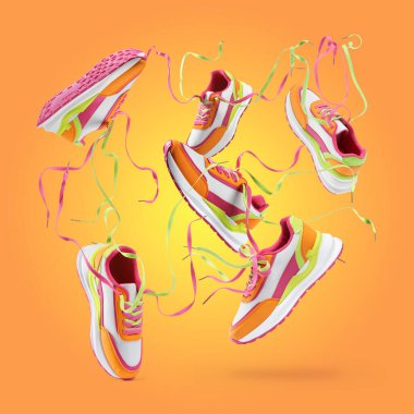 Turuncu arka planda parlak şık spor ayakkabı, kolaj tasarımı