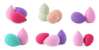 Beyaz üzerine izole edilmiş farklı makyaj süngerleri.