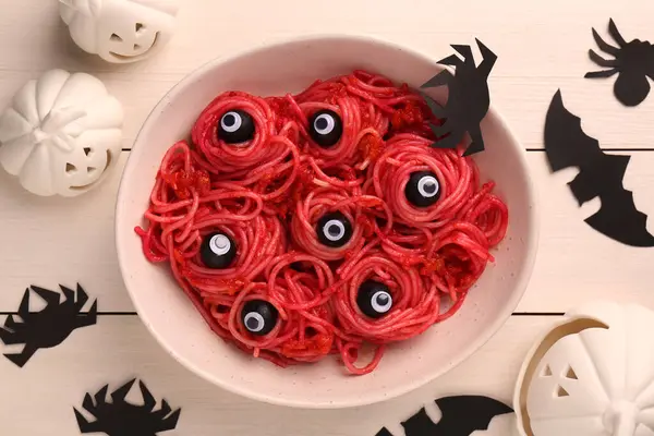 Red Pasta Decorative Eyes Olives Bowl Served White Wooden Table Royalty Free Stock Photos