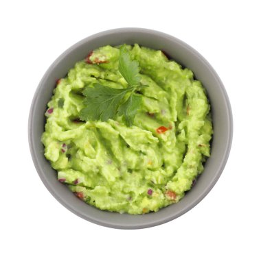 Bir kase lezzetli guacamole maydanozlu, beyaz, üst manzara