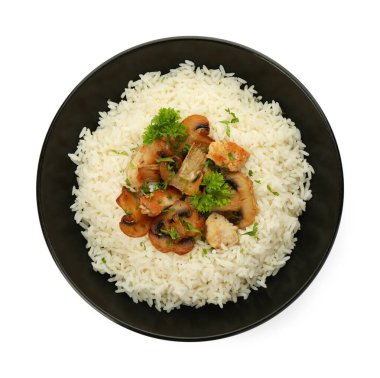 Maydanozlu lezzetli pirinç ve beyaz mantarlar, üst manzara.