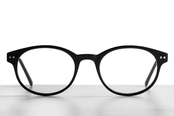 Stylish Glasses Black Frame Table White Background — Stock Photo, Image