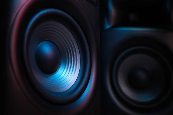 Modern sound speakers as background, closeup view