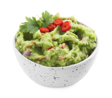 Biber ve maydanozla servis edilen nefis guacamole.