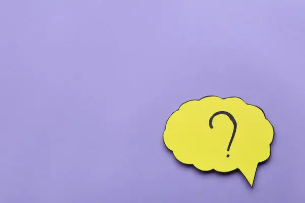 Paper speech bubble with question mark on violet background, top view. Space for text