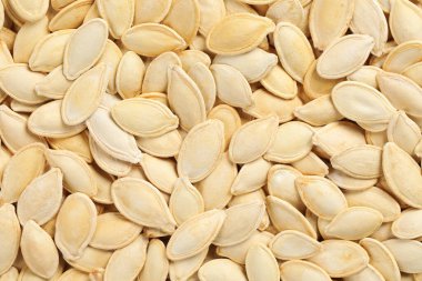 Arkaplan olarak birçok kabak çekirdeği, üst görünüm