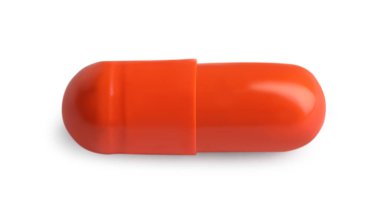 Beyaza izole edilmiş bir hap. İlaç tedavisi.