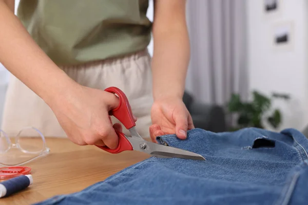 Woman Cutting Jeans Scissors Table Closeup — Stock Photo, Image