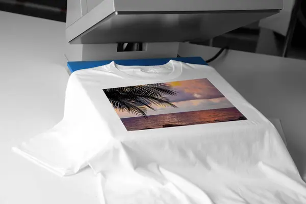 Custom t-shirt. Using heat press to print beautiful image of tropical seascape