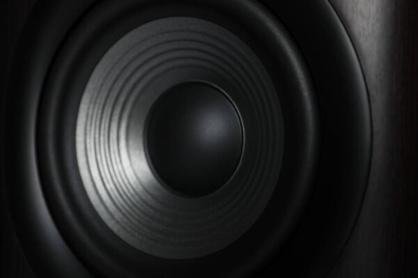 One modern sound speaker as background, closeup