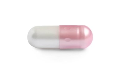 Beyaz arka planda bir hap. Tıbbi tedavi