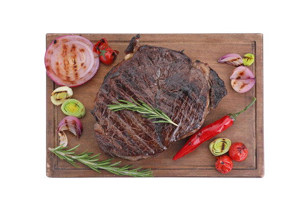 Delicious fried beef meat with vegetables isolated on white, top view