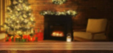 Noel ağacı ve şöminesi olan boş bir masa. Tasarım için alanı olan pankart