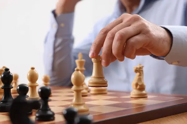 Colleagues playing chess hi-res stock photography and images - Alamy