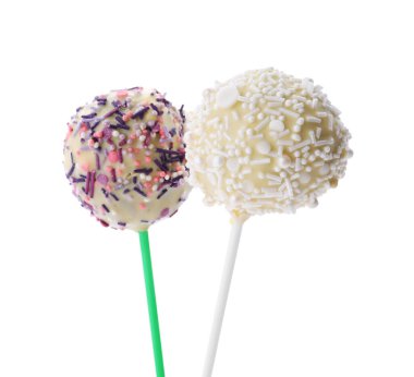 Beyaz üzerine serpiştirilmiş tatlı kek parçaları. Lezzetli şekerlemeler.