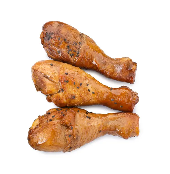 Chicken legs glazed with soy sauce isolated on white, top view