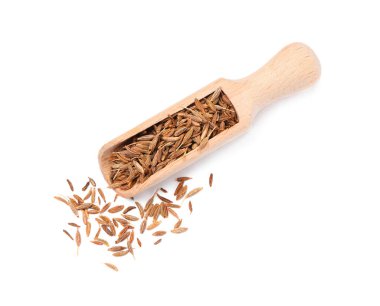 Beyaz, üst görünüm izole aromatik oyma (Farsça kimyon) tohumları kepçe