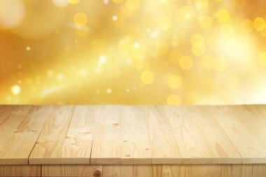 Boş ahşap tahta bulanık Noel ışıklarına karşı dizayn için boşluk